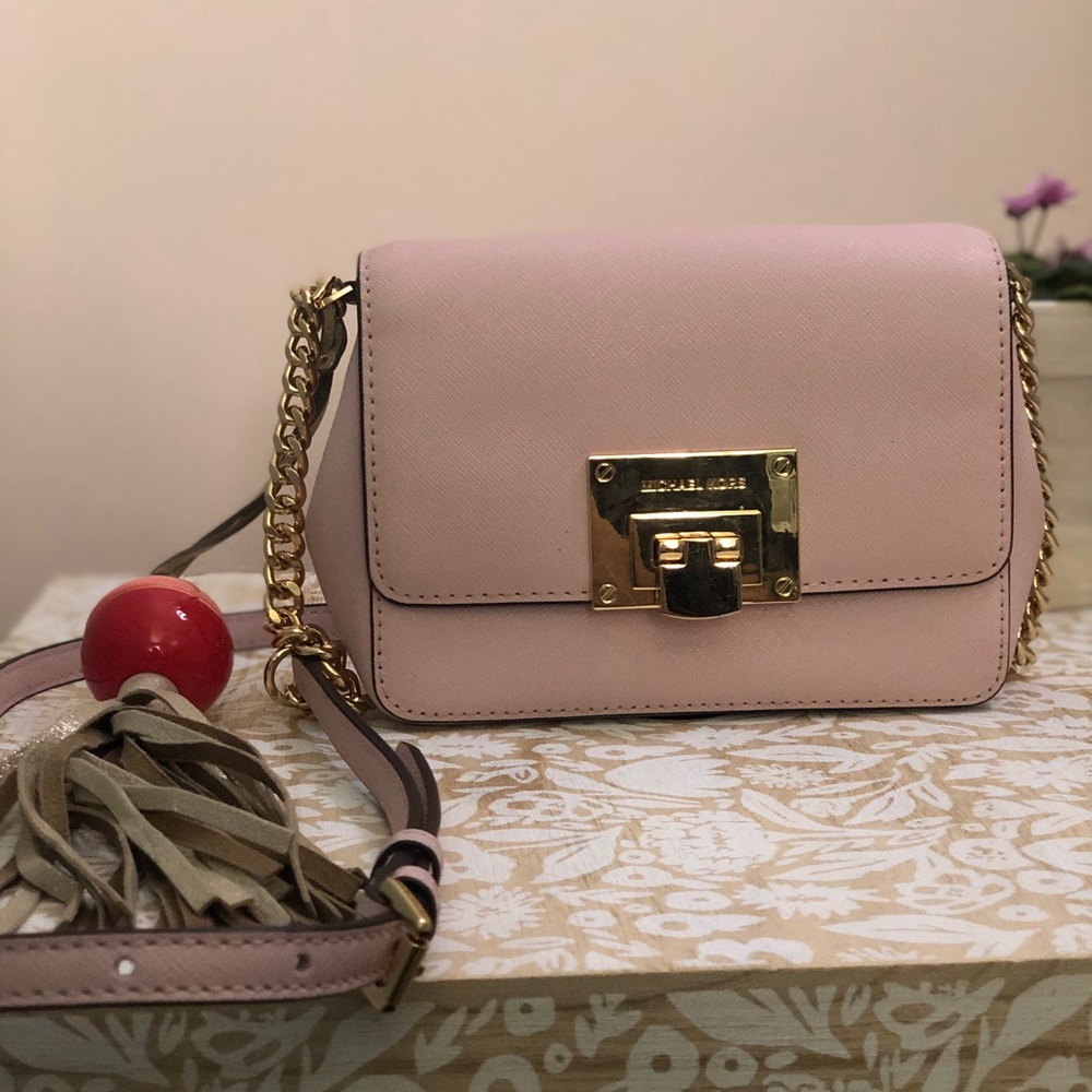 Small pink Micheal Kors cross-body bag